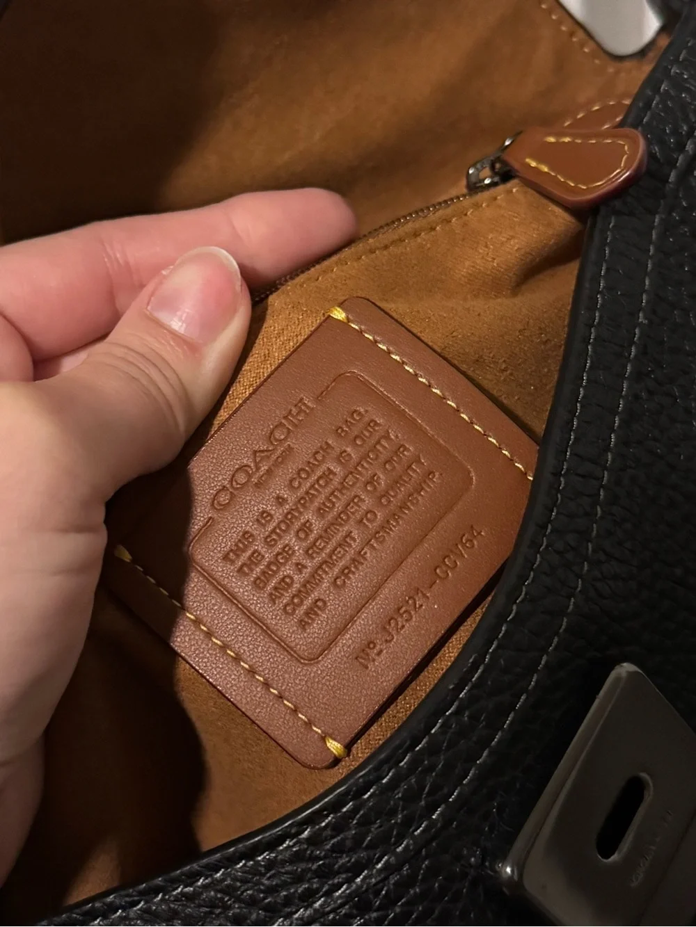Coach compact pebbled